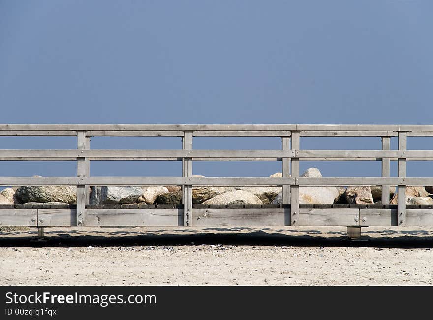 A wooden beach walk in the sand