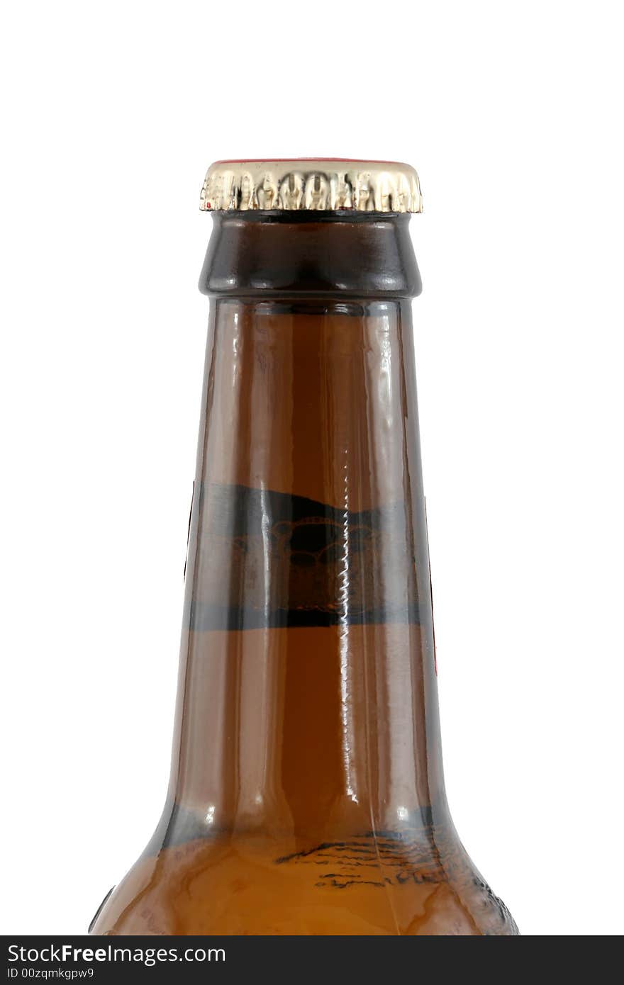 A Isolated brown beer bottle with cap