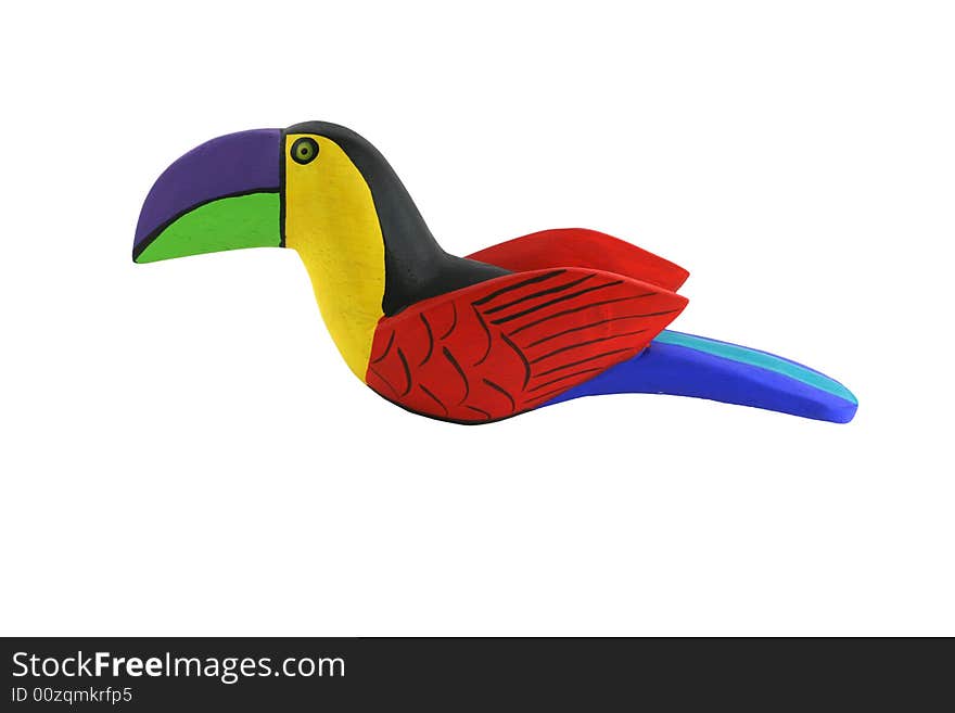 Isolated Brightly colored handcarved wooden toucan