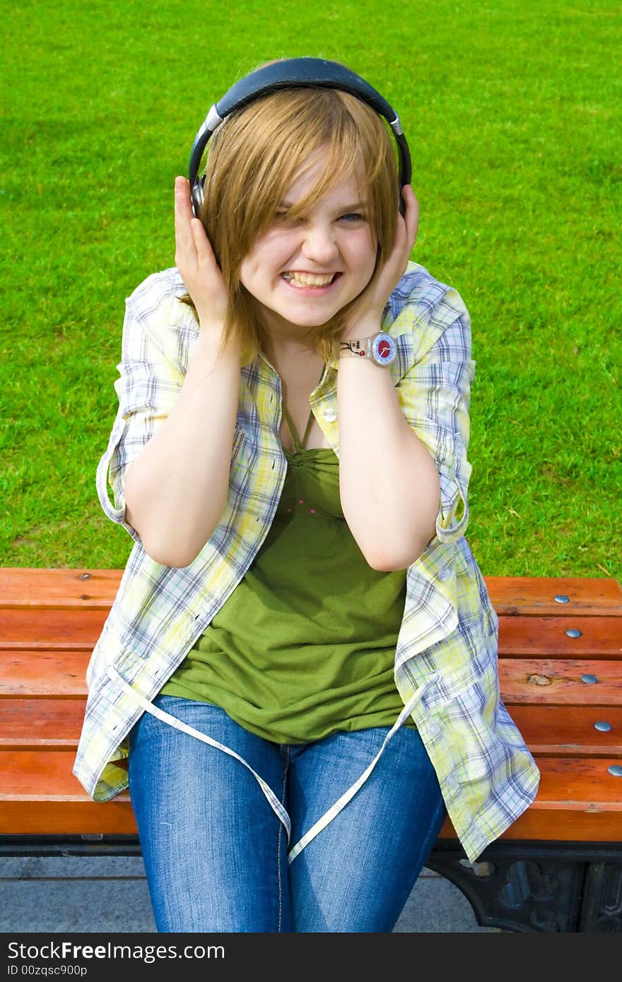 Young attractive girl with headphones