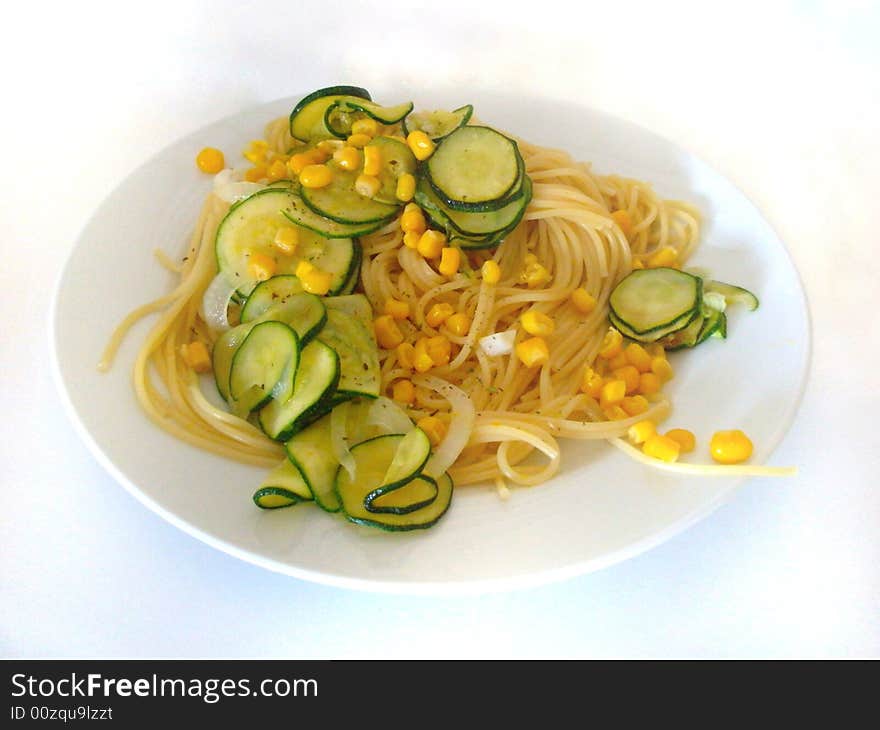 Pasta with zucchini and corn