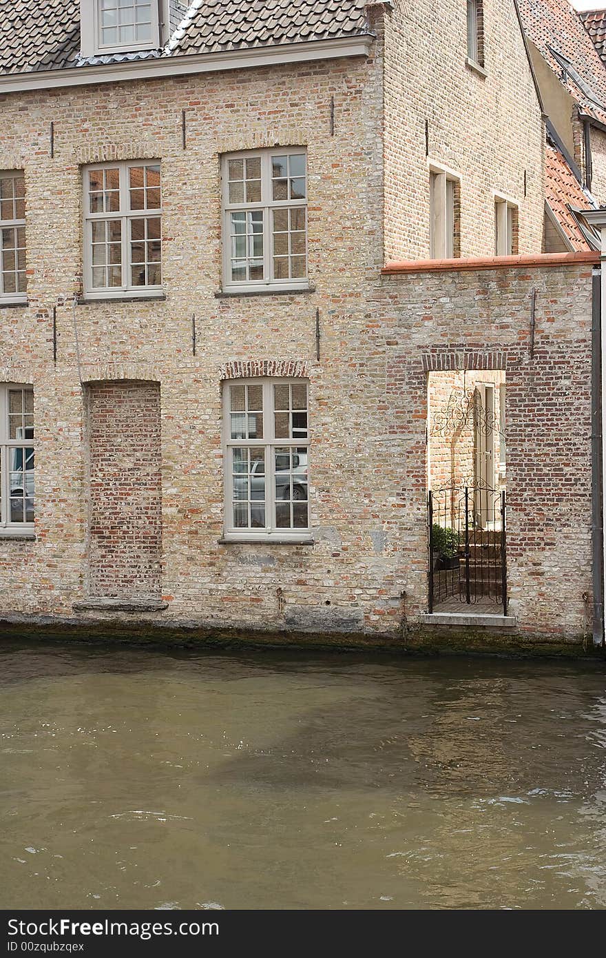 A fens by a canal in Belgium. A fens by a canal in Belgium