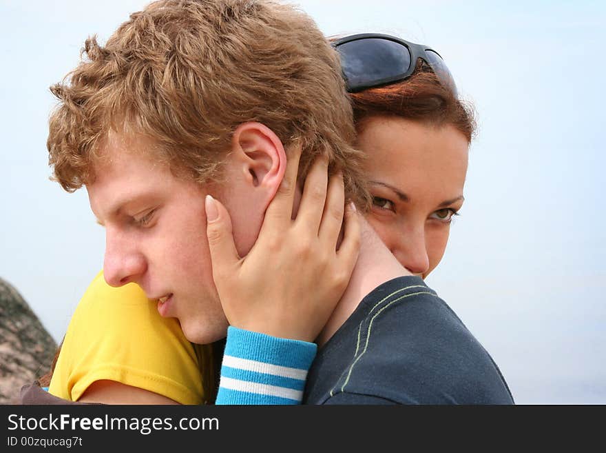 Happy young couple relaxing outdoors. Happy young couple relaxing outdoors