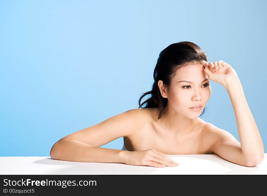 Refreshing and clean face of young woman thinking