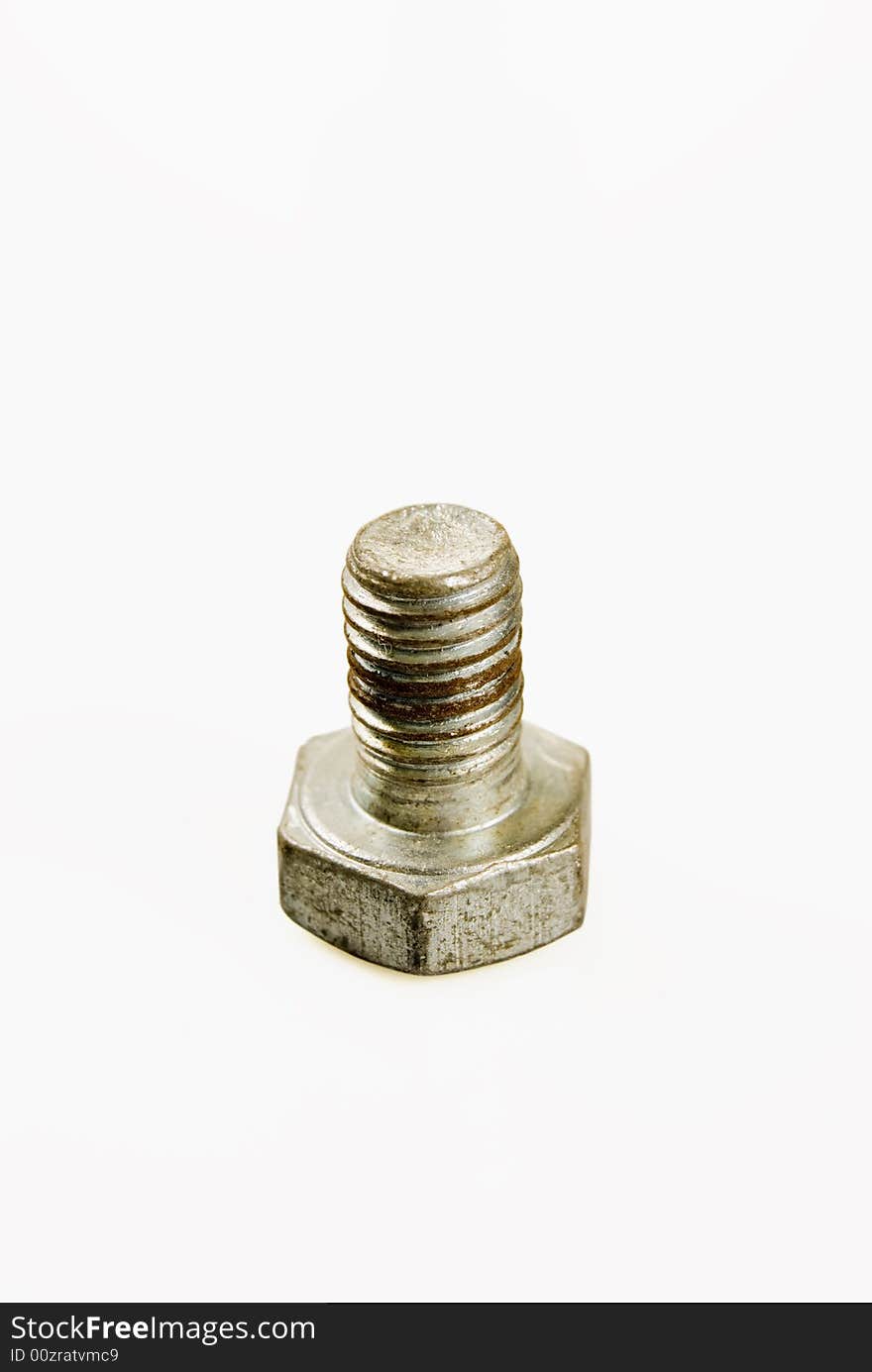 Rusted bolt against white background