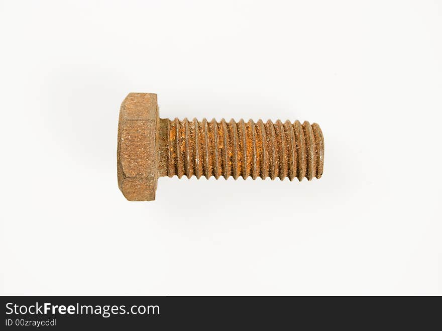 Rusted bolt against white background