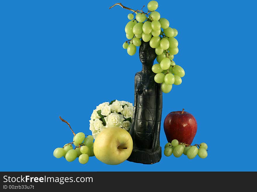 Flowers, Fruit And Figurine