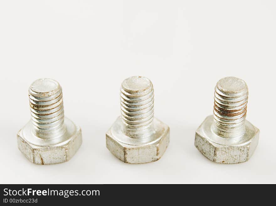 Rusted bolt against white background