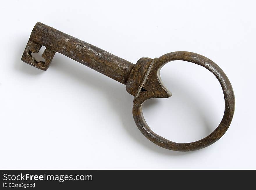 Vintage rusted key isolated on white. Vintage rusted key isolated on white