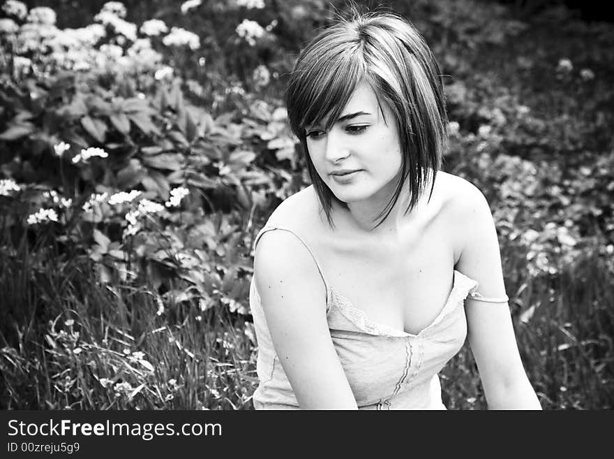 Portrait of sensual woman in nature, black and white.