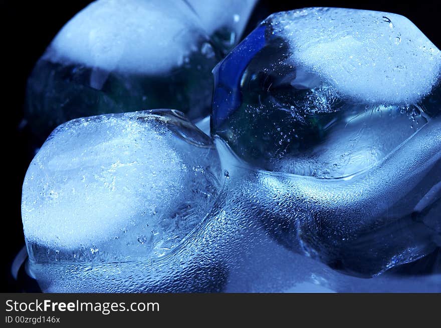 Close-up of blue melting ice cubes