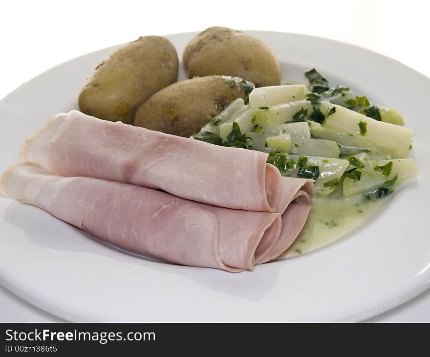 Cooked ham with stem cabbage and potatoes. Cooked ham with stem cabbage and potatoes