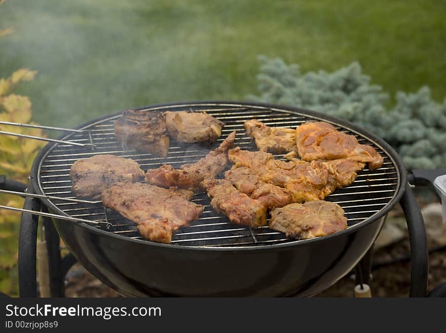 Meat on a hot grill. Meat on a hot grill