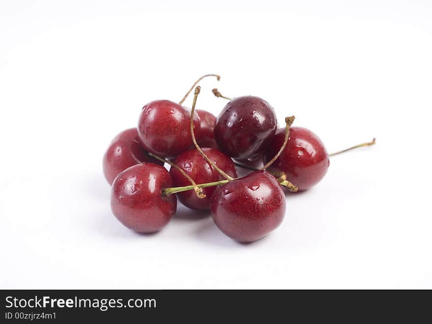 Sweet fresh red cherries isolated on white background. Sweet fresh red cherries isolated on white background