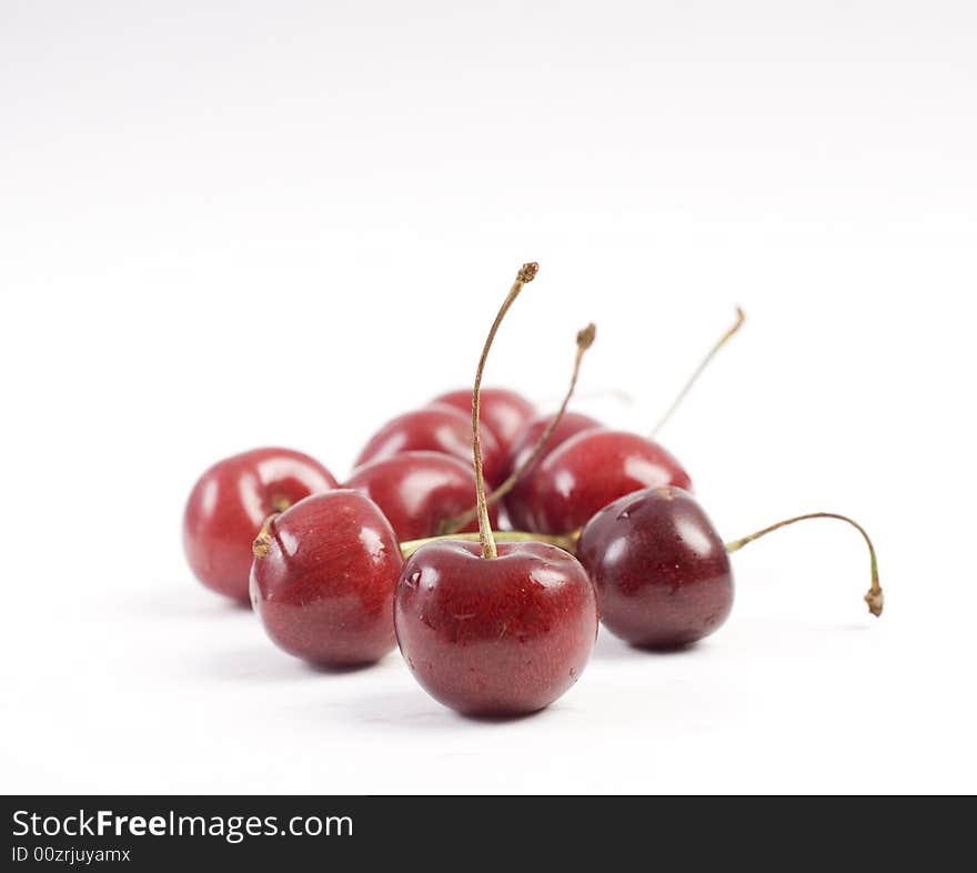 Sweet fresh red cherries isolated on white background. Sweet fresh red cherries isolated on white background