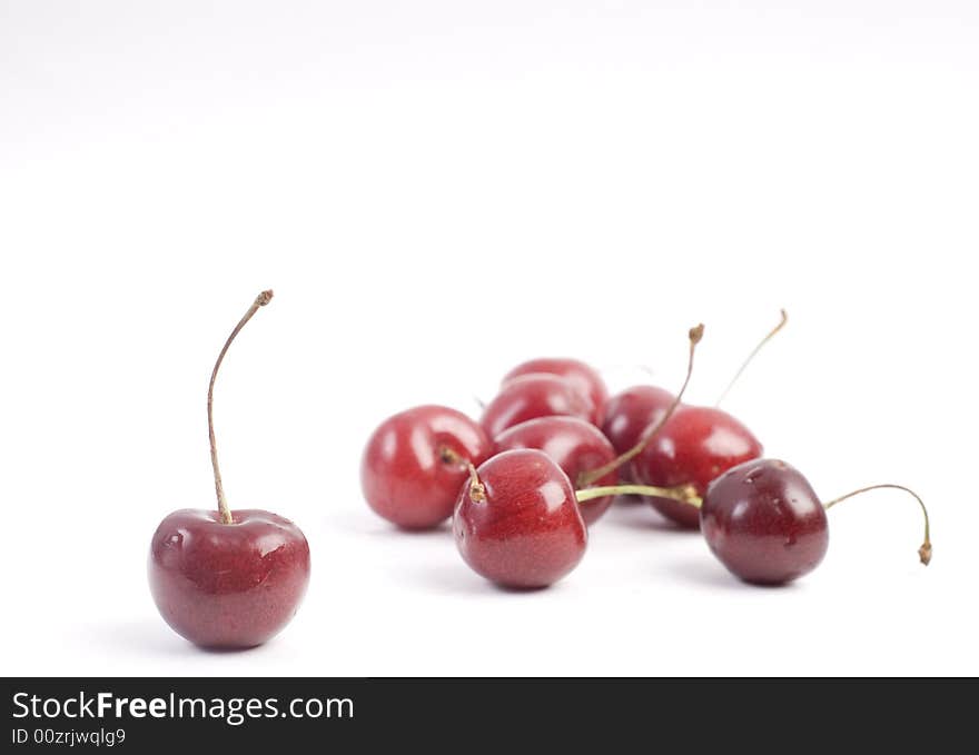 Sweet fresh red cherries isolated on white background. Sweet fresh red cherries isolated on white background