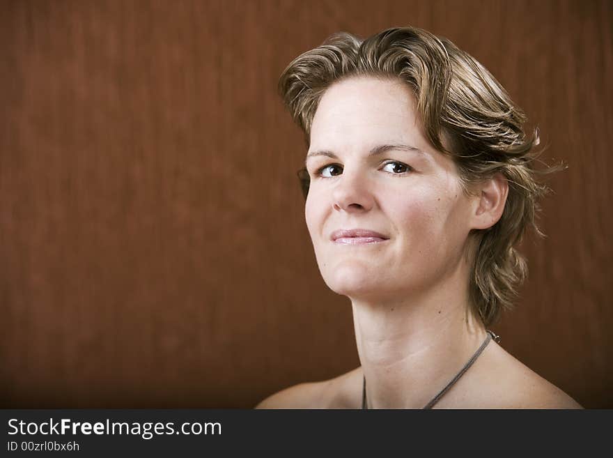 Portrait of a confident woman in a studio setting