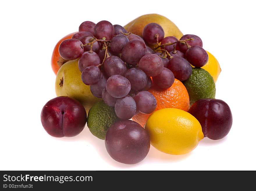 Heap  of  various fruits isolated on white. Heap  of  various fruits isolated on white