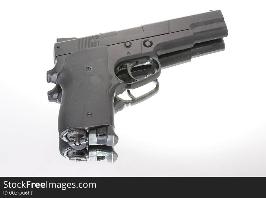 Black semi automatic handgun isolated.