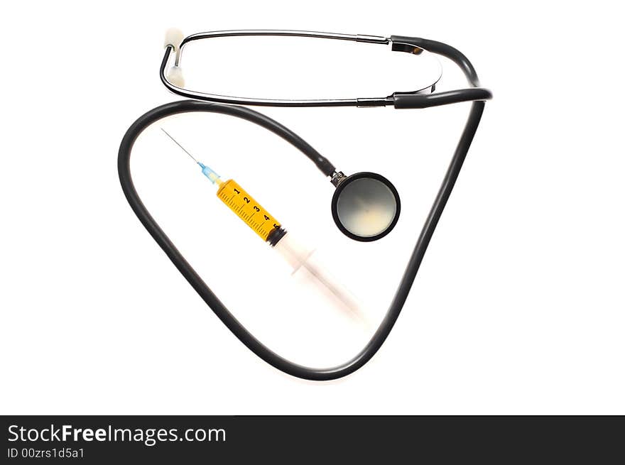 A composition of stethoscope and syringe. A composition of stethoscope and syringe