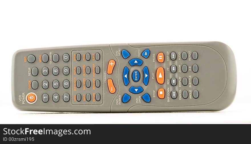 An isolated blue and orange remote control on white. An isolated blue and orange remote control on white.