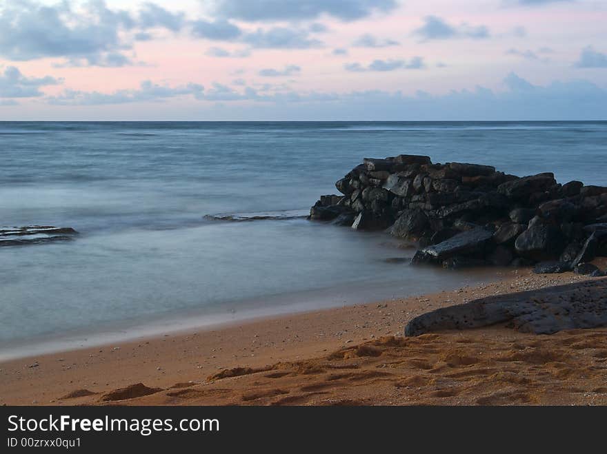 Beach Sunrise with the water motion blurred. Beach Sunrise with the water motion blurred