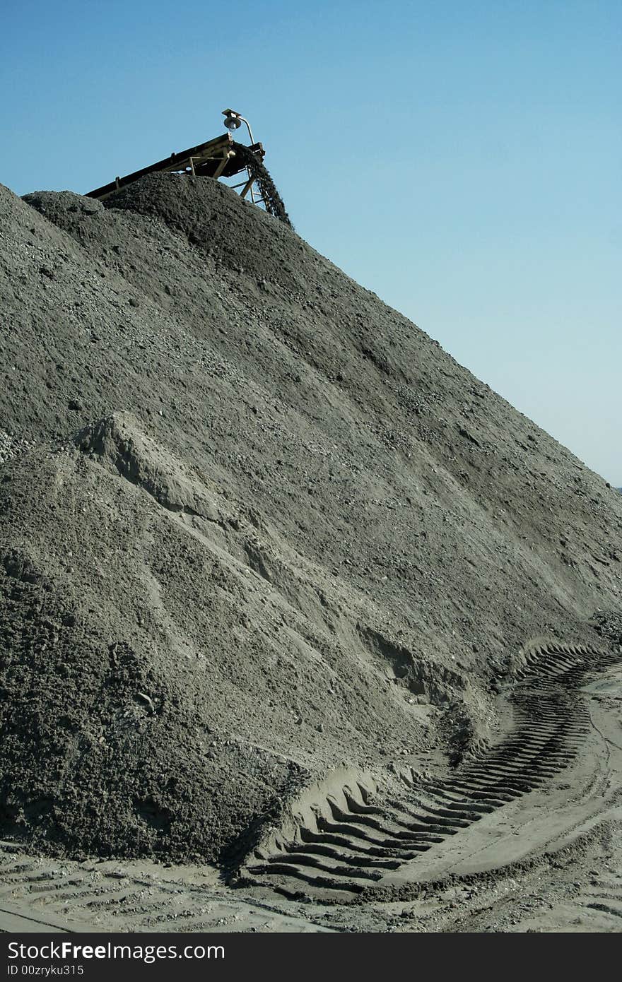 Pile of sand and rocks near the beach. Pile of sand and rocks near the beach