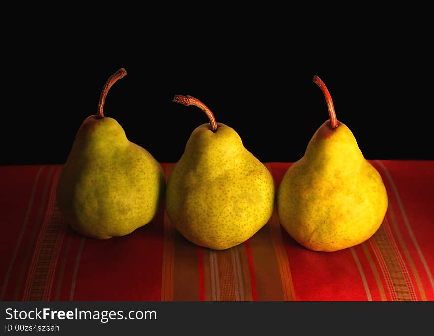 Pears set up with varoius backgrounds on various fabrics