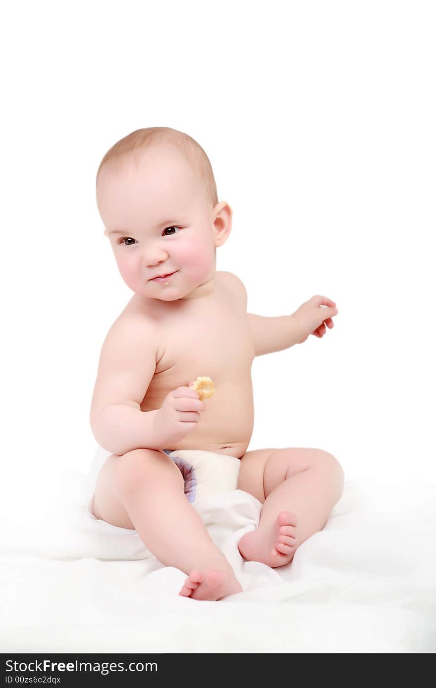 Beautiful baby. Shot in studio. Isolated on white. Beautiful baby. Shot in studio. Isolated on white.