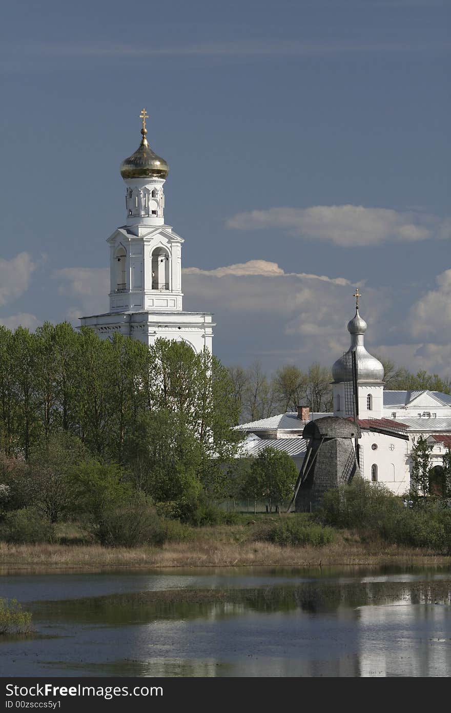 Russia, white church near lake