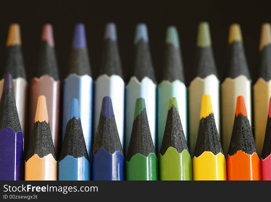 A part of  pencils with a simple  colorful background. A part of  pencils with a simple  colorful background