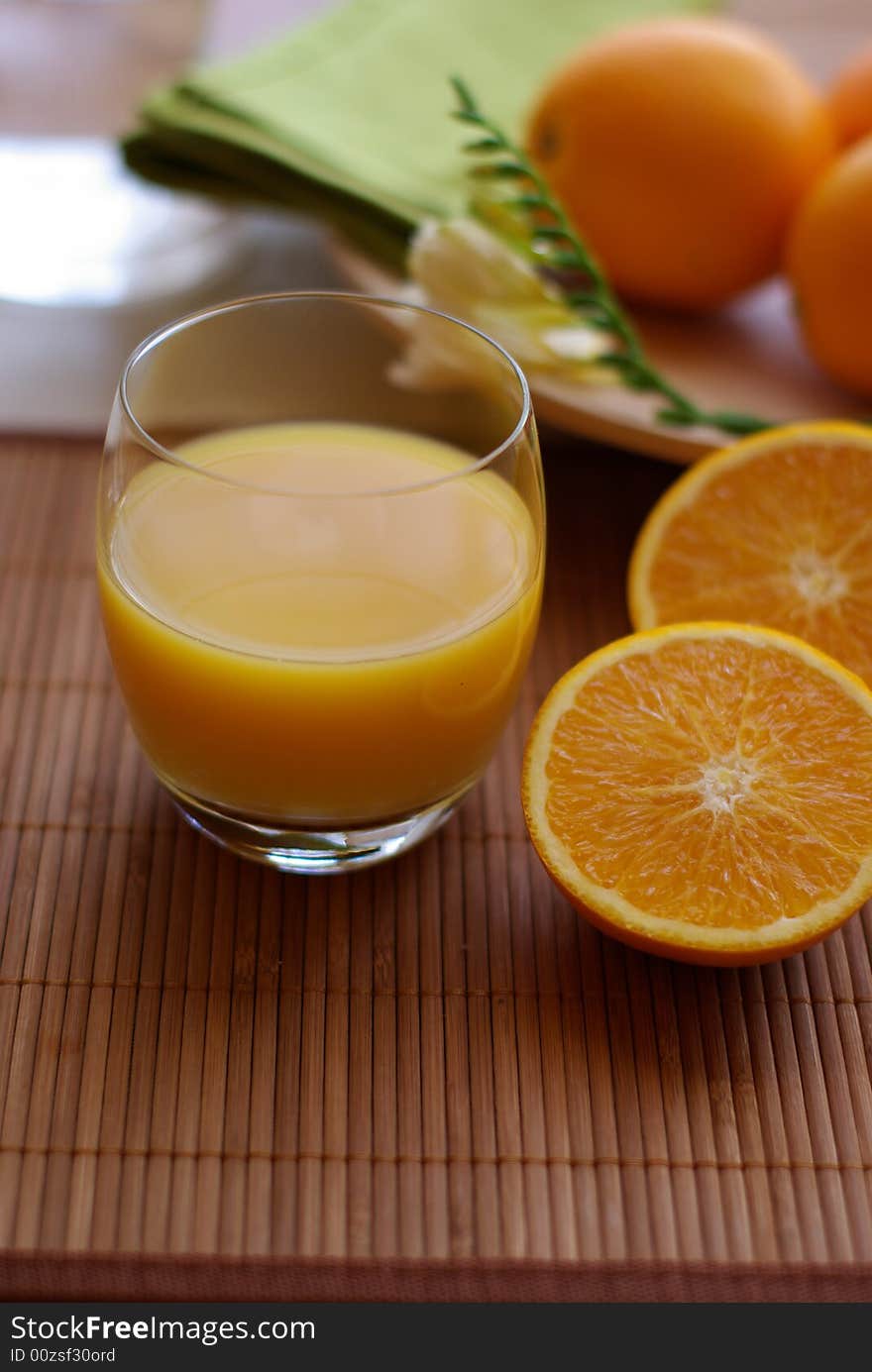 Orange and juice on the table