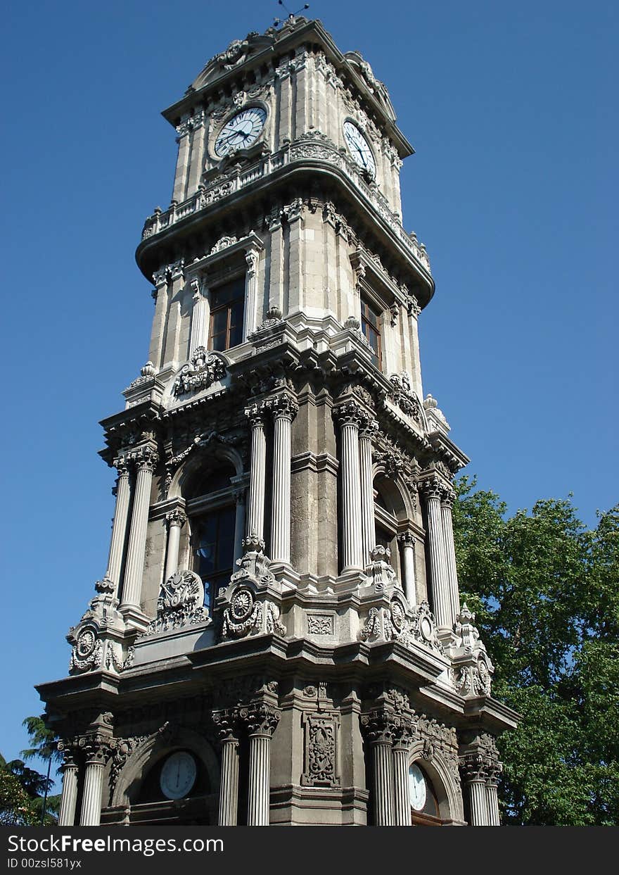 Beautiful baroque style clock tower of Dolmabahce palace in Istanbul. Beautiful baroque style clock tower of Dolmabahce palace in Istanbul