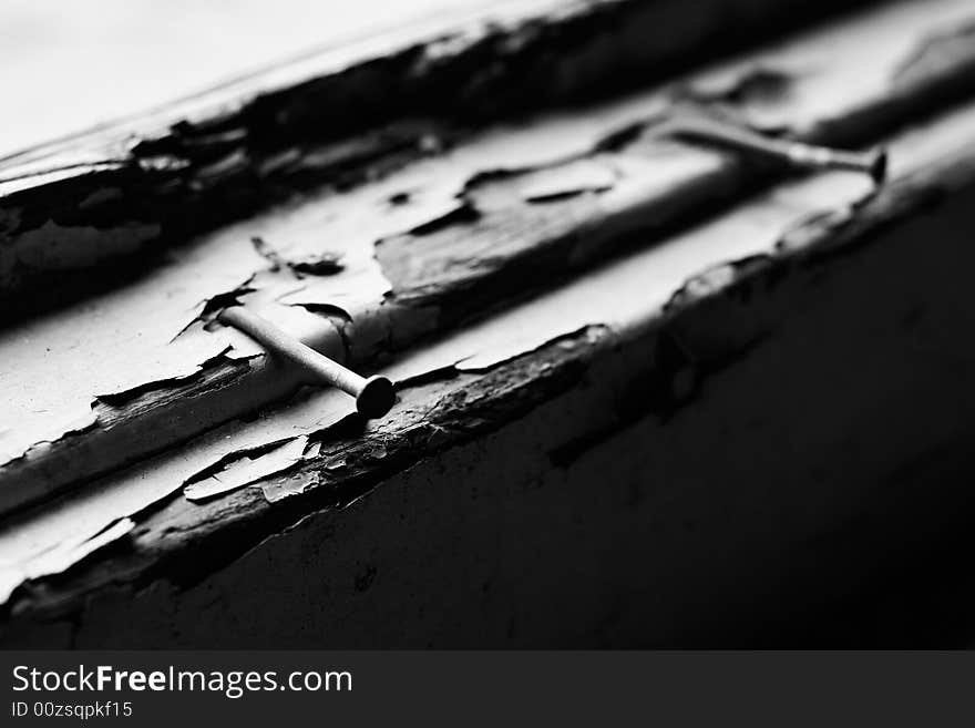 Bended nails on window-shelf