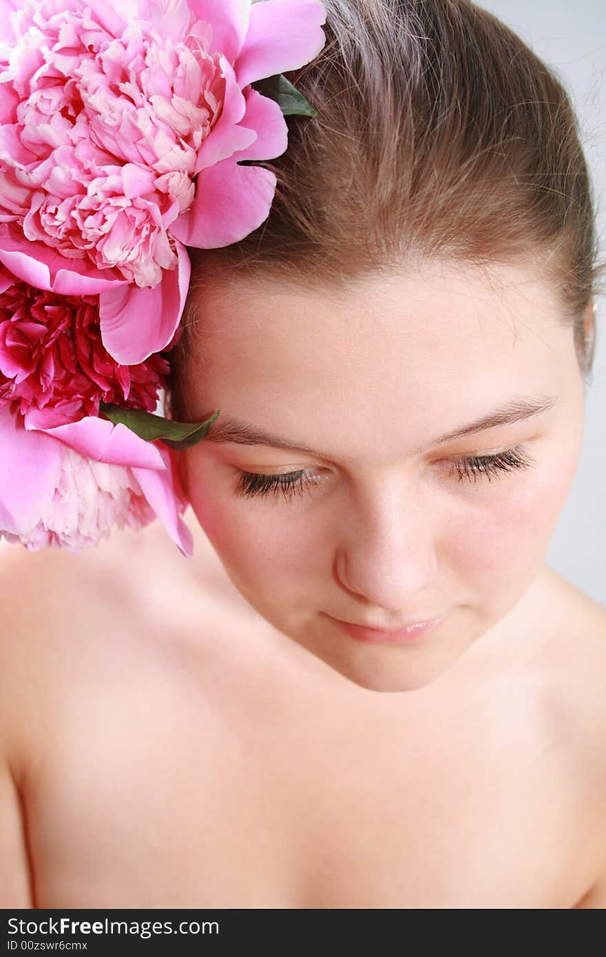 Face of woman with flower