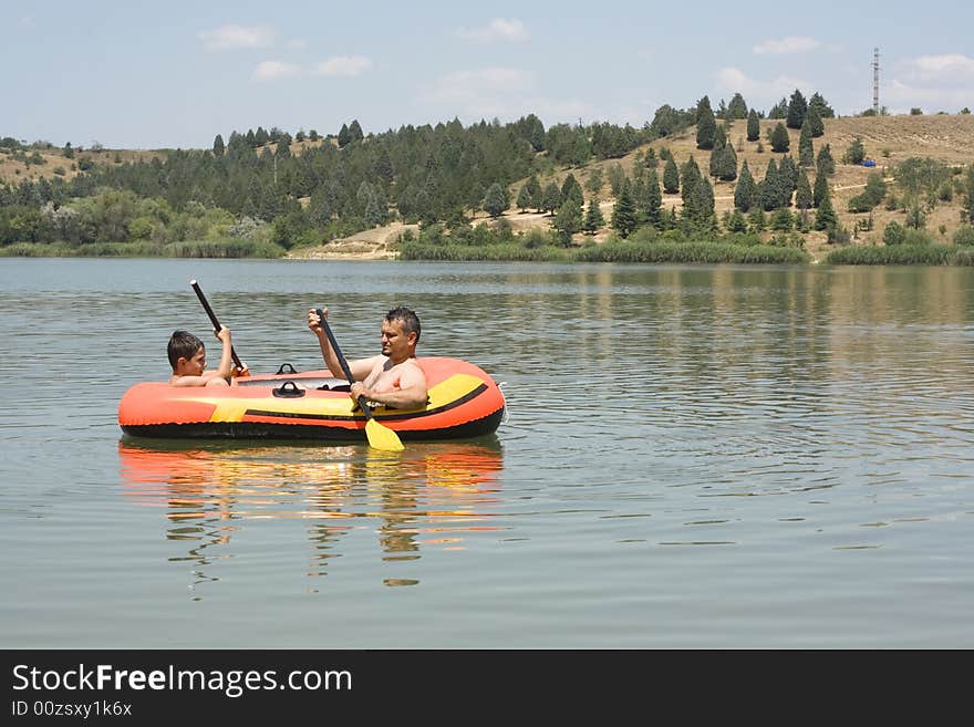 Father and son in the boat