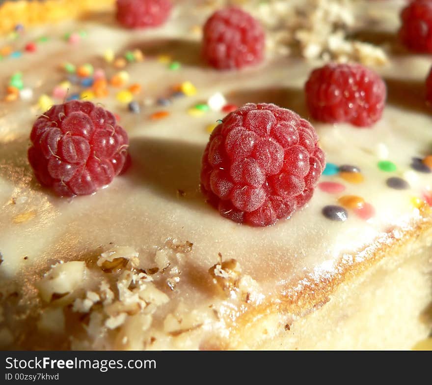 Red berry of raspberry on a pie