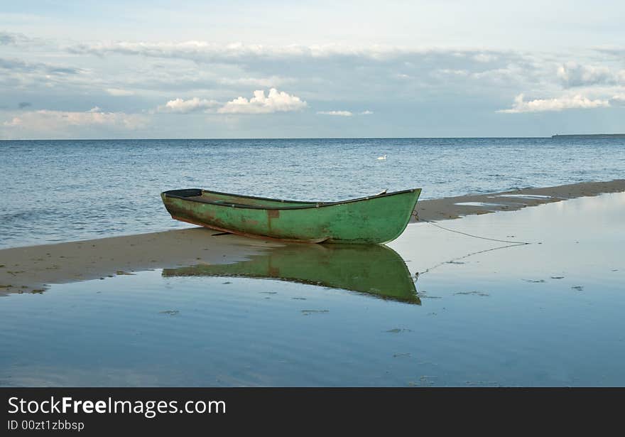 Baltic sea. The Riga beach.Boat