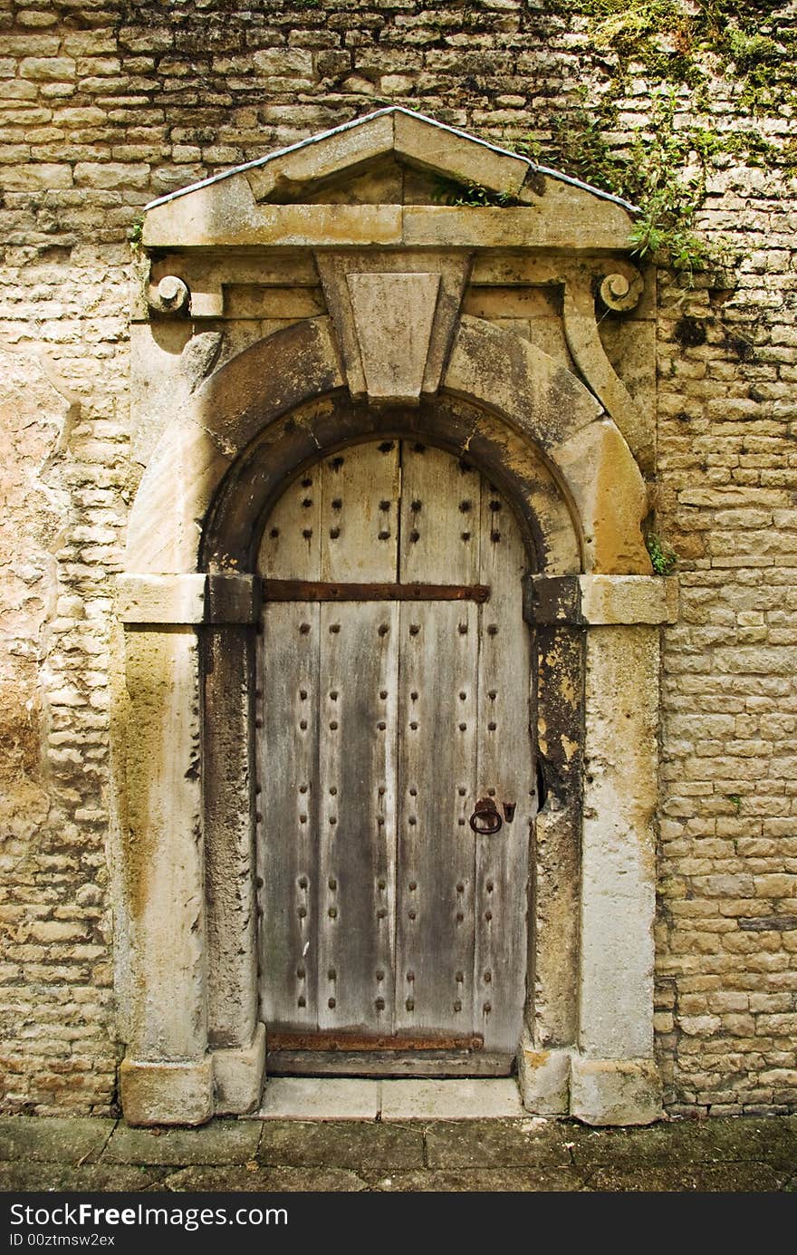 A solid oak door in the remains of an Elizabethan mansion. A solid oak door in the remains of an Elizabethan mansion