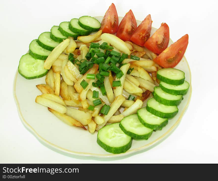 Prepared potato with cucumbers and tomatoes