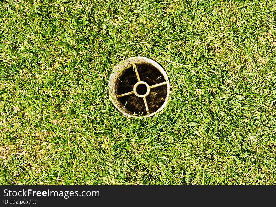 A pitch and putt green in an urban park. A pitch and putt green in an urban park