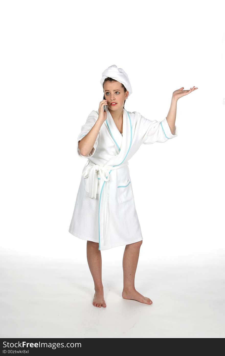 Teen in towel and robe on phone with hand out