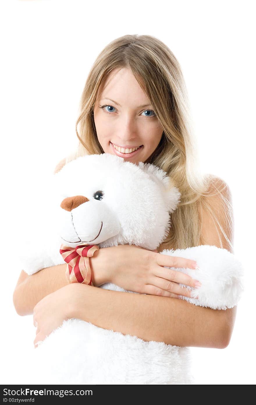 Close-up lovely young blonde girl with teddy bear isolated on white background