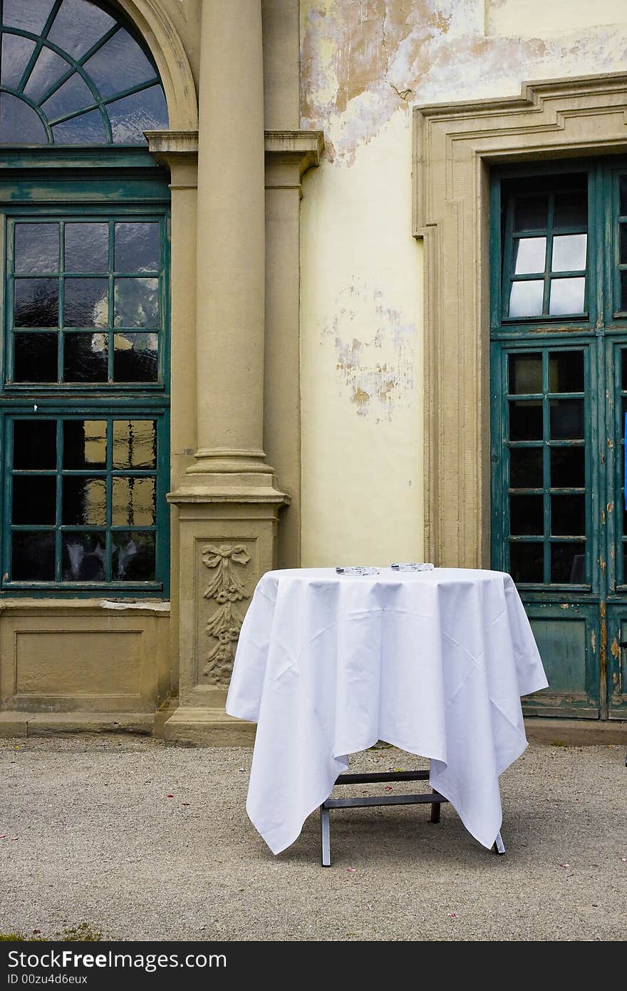 Table In Front Of Old Building