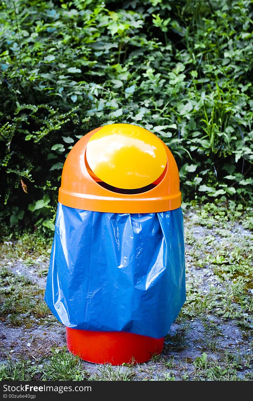 Plastic bin near a swimming pool