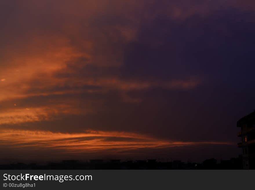 A city in a red sea at the sunset. A city in a red sea at the sunset