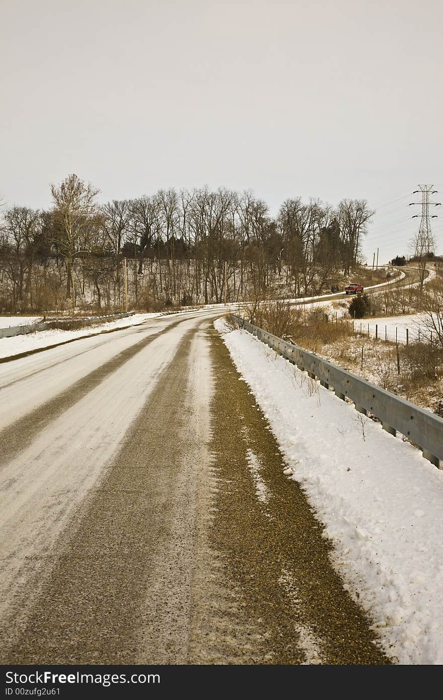 Winter rural road crossing bridge. Winter rural road crossing bridge