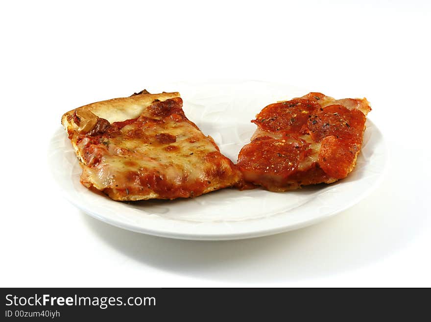 A slice of cheese and a slice of pepperoni pizza on a white plate, over a white background with room for copy. A slice of cheese and a slice of pepperoni pizza on a white plate, over a white background with room for copy.