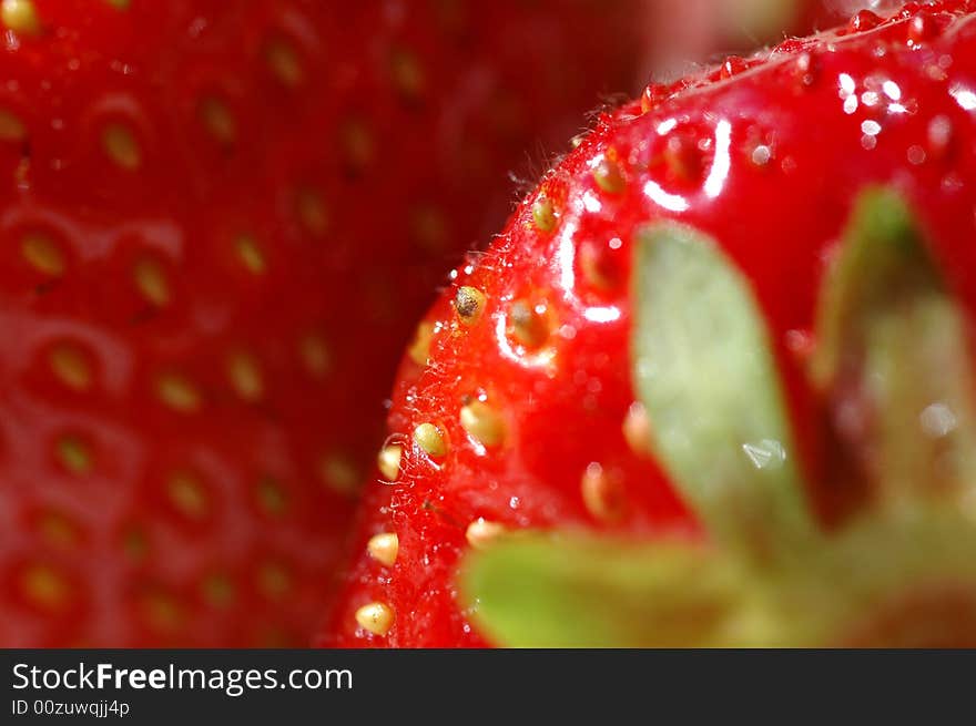 Strawberries for everyone. Closeup on a pair of fresh strawberries