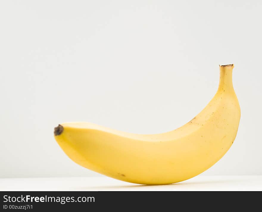 A ripe, yellow banana isolated on white. A ripe, yellow banana isolated on white.